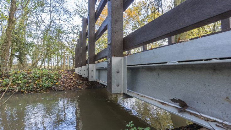 Galvanised steel beams on a pedestrian bridge