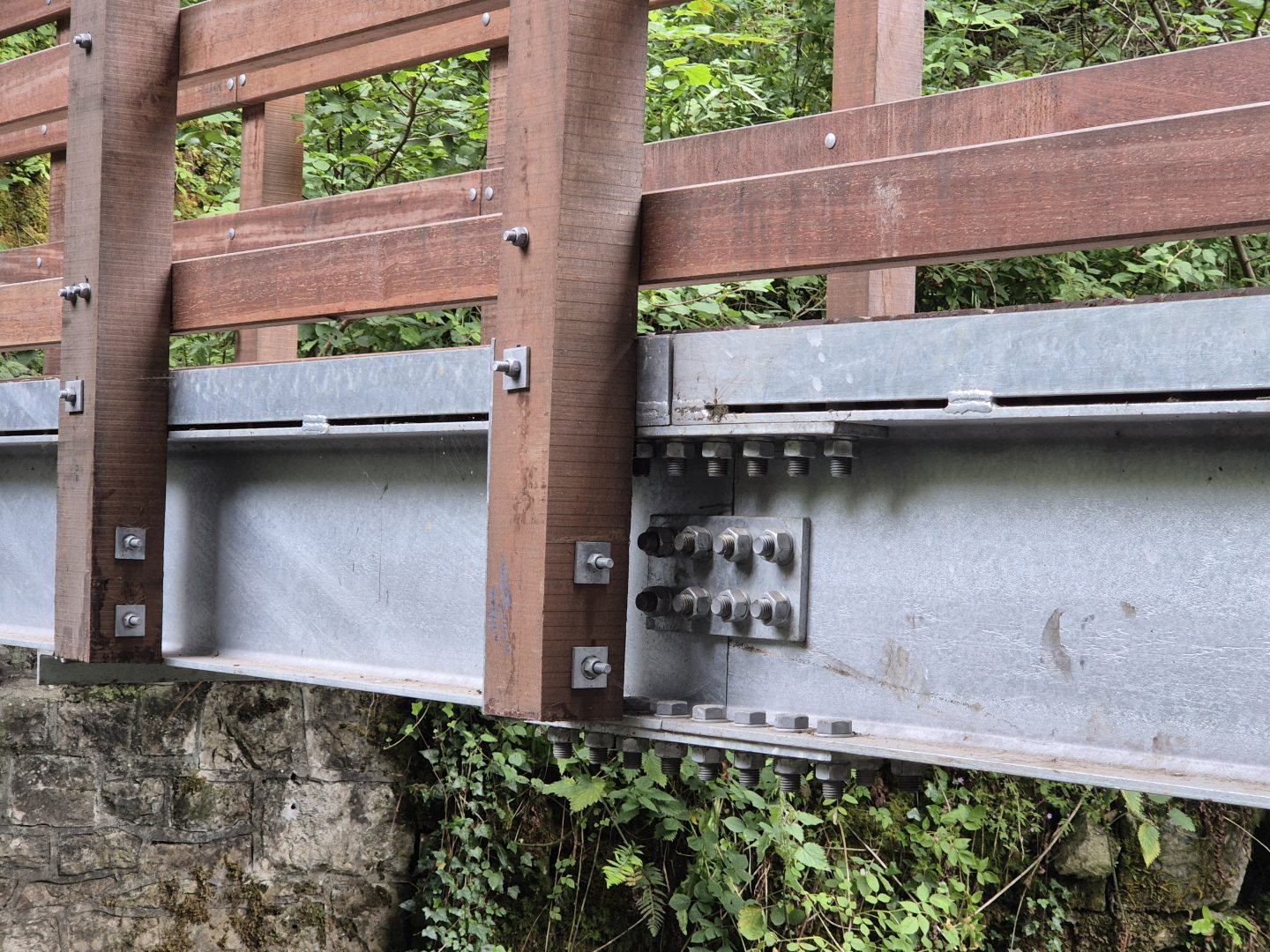 steel bridge beams spliced together with bolts