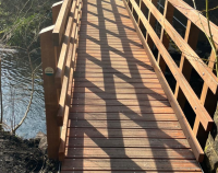 12 metre footbridge with hardwood timber deck and parapet at Chee Dale