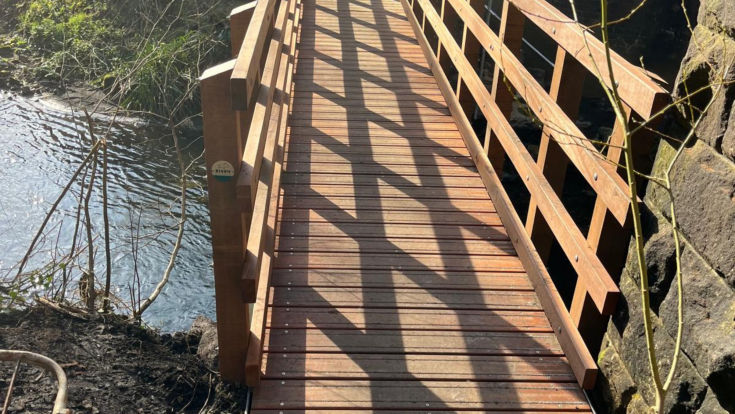Timber deck and parapet on a Bison pedestrian bridge