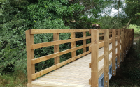 12 metre timber footbridge with Douglas Fir parapets in Rutland