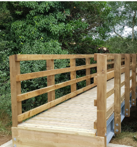 12 metre timber footbridge with Douglas Fir parapets in Rutland