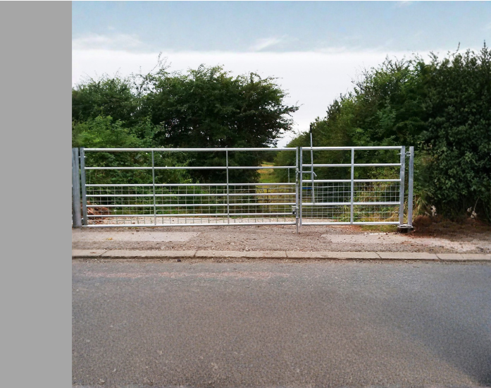 The Ravensden Gate - a self closing galvanised steel gate along with a meshed field Gate