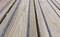 Timber deck board on a Bison bridge