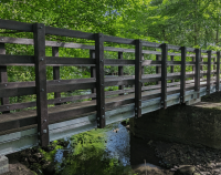 10 metre footbridge with recycled plastic deck boards and parapets