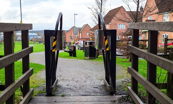 A short pedestrian bridge in Glenfield, made with recycled plastic deckboards, supplied by www.builtbybison.co.uk