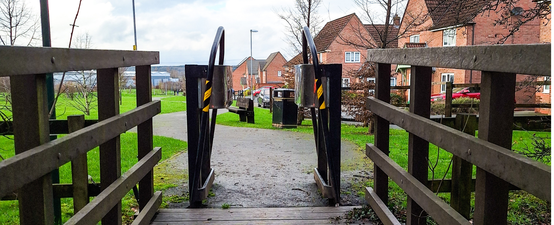 A short pedestrian bridge in Glenfield, made with recycled plastic deckboards, supplied by www.builtbybison.co.uk