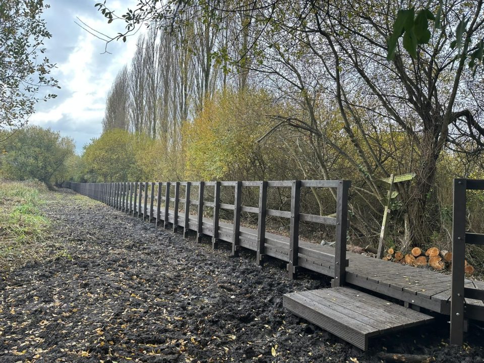 Re-Life40 Recycled plastic boardwalk structure crossing a reed bed