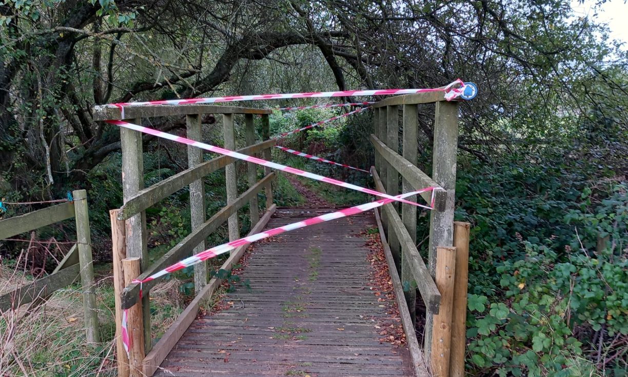 A footbridge closed for safety reasons