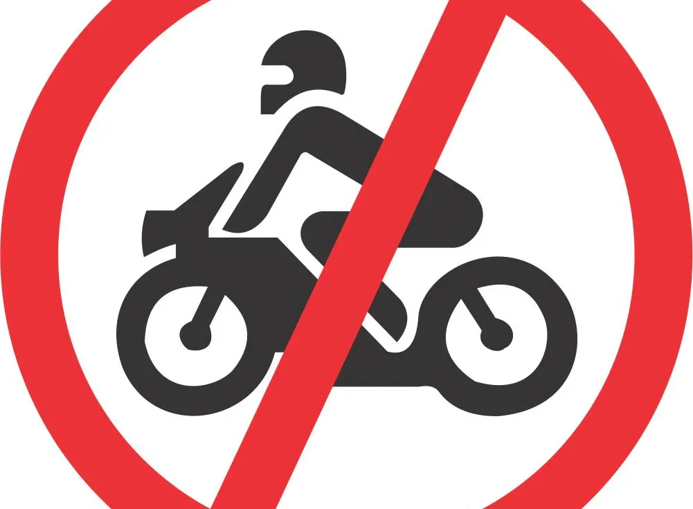 A sign to show that motorbikes are allowed on this footpath